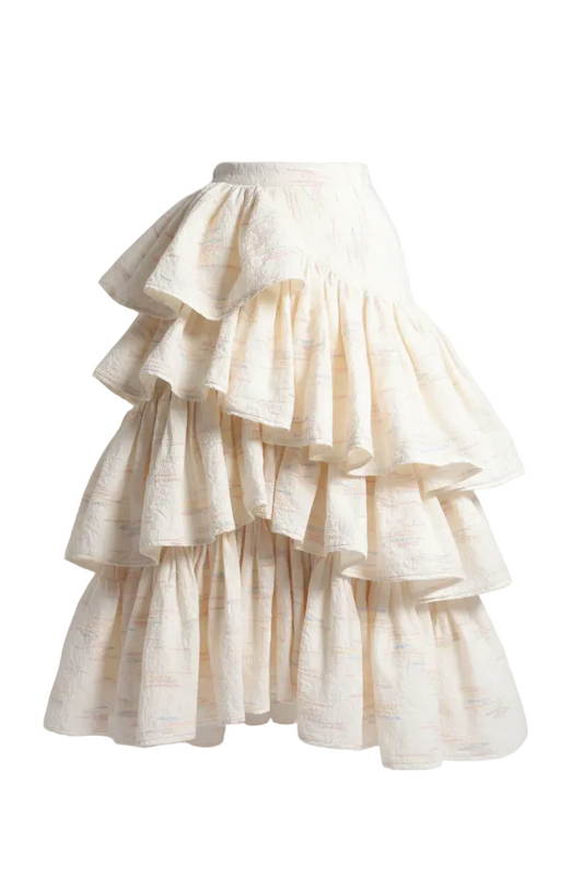 Corvani Vesper ILÈ Editorial Ìyá tiered ruffle midi skirt with textured fabric and flowing silhouette.