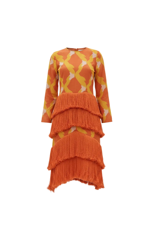 CORVANI VESPER ÀṢÀ layered fringe midi dress showing its flowing fabric and intricate fringe details in a stylish silhouette.